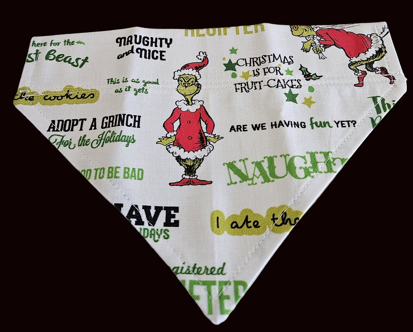 Christmas-themed bandana with Grinch quotes and graphics on a white background