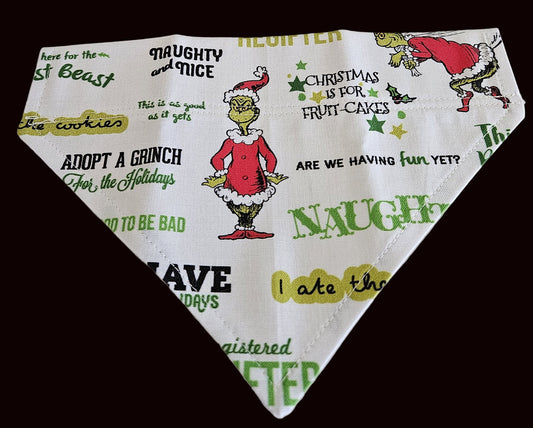 Christmas-themed bandana with Grinch quotes and graphics on a white background